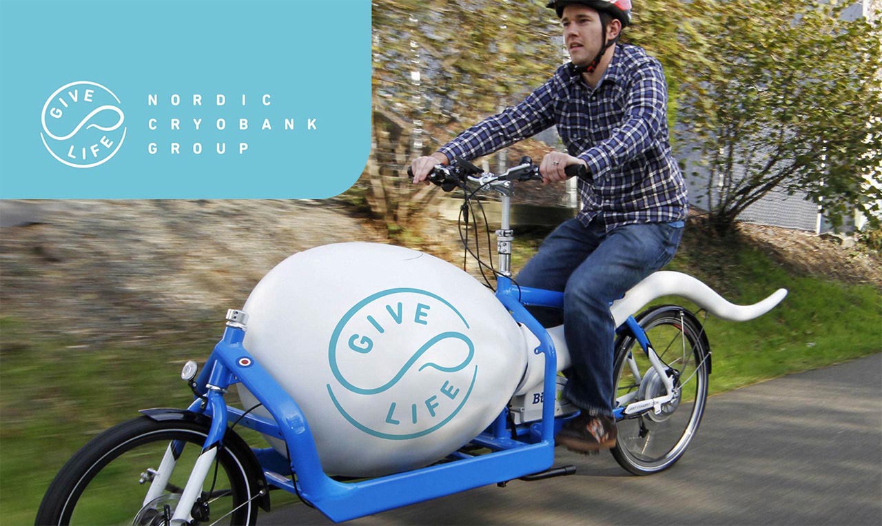 A man riding a bike with a refreshed brand design.