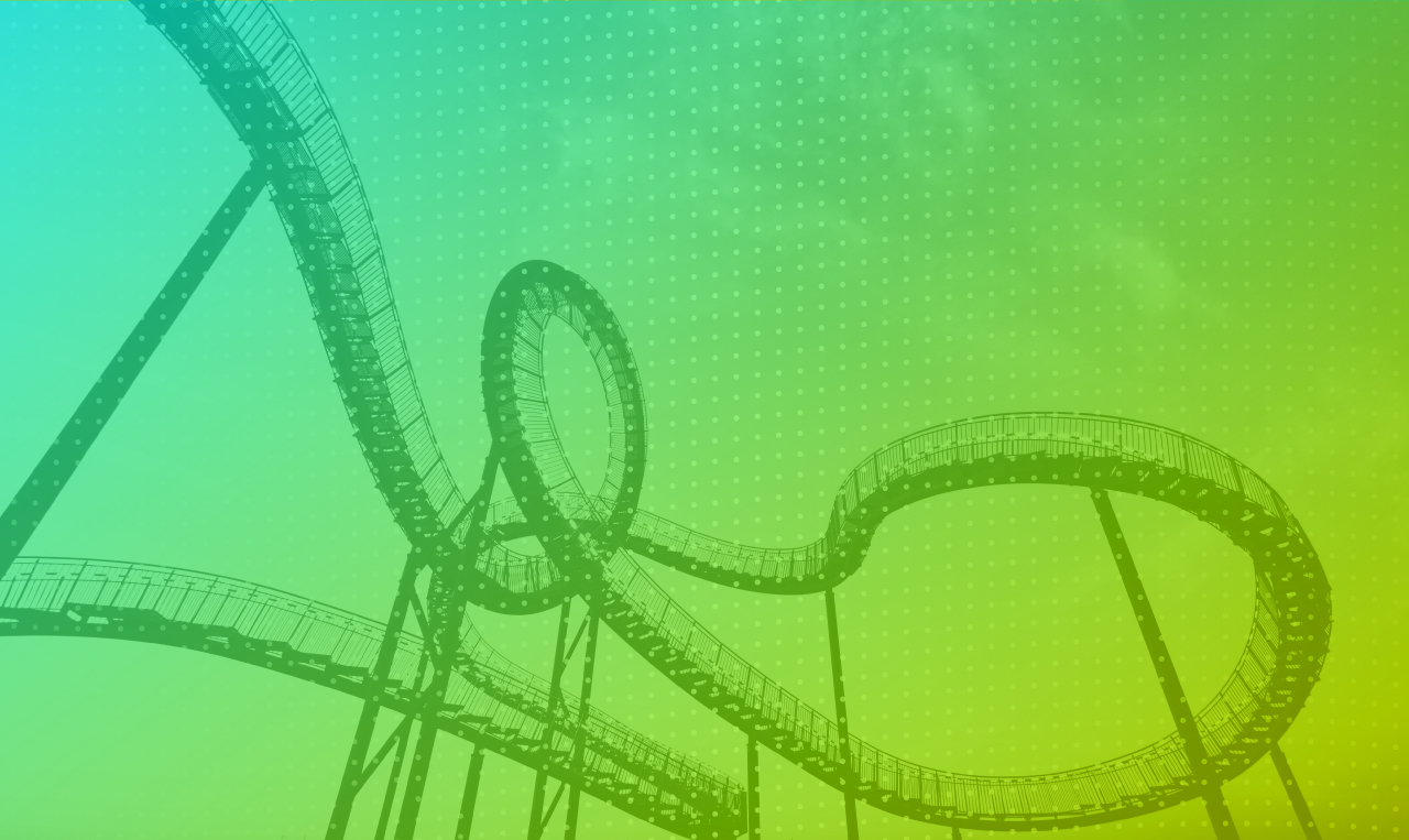 An image of a roller coaster on a green background.