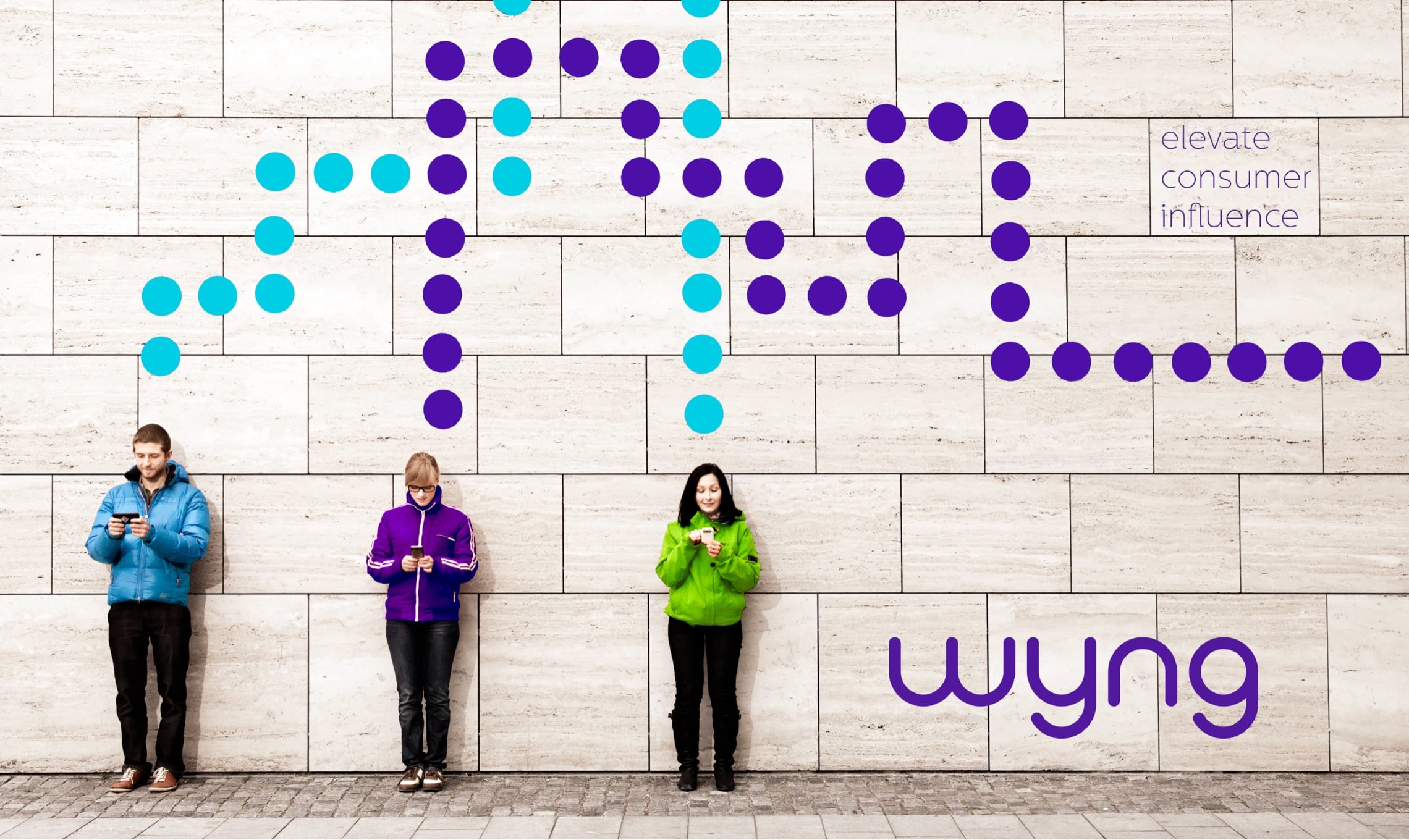 3 young adults standing in front a wall with connecting dots lines and wyng logo