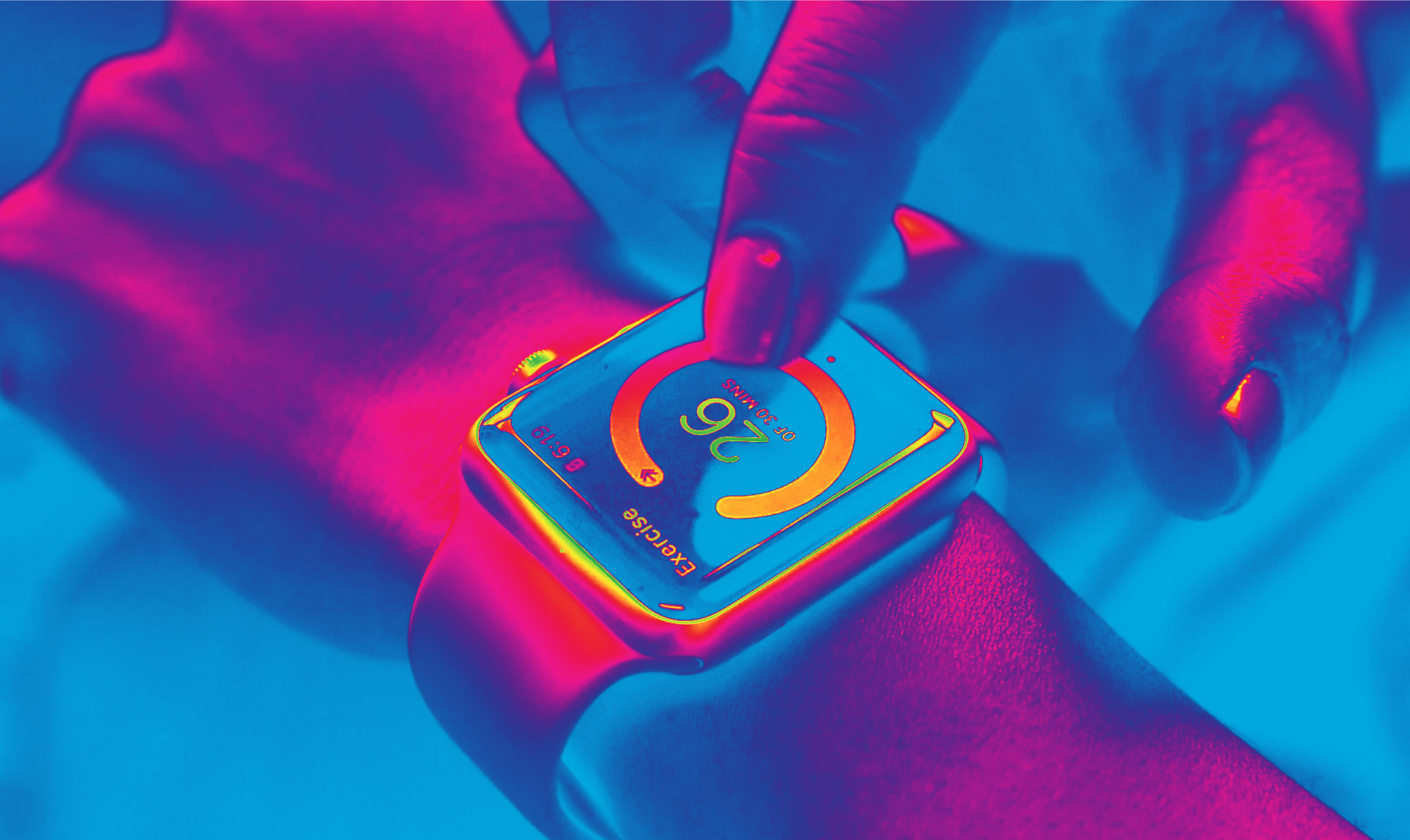 A person holding an apple watch in front of a colorful background.