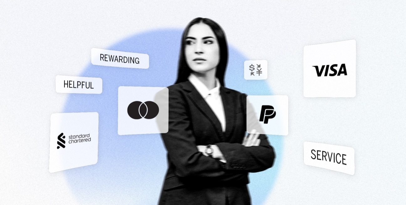 A woman in a business suit is standing in front of a number of payment icons.