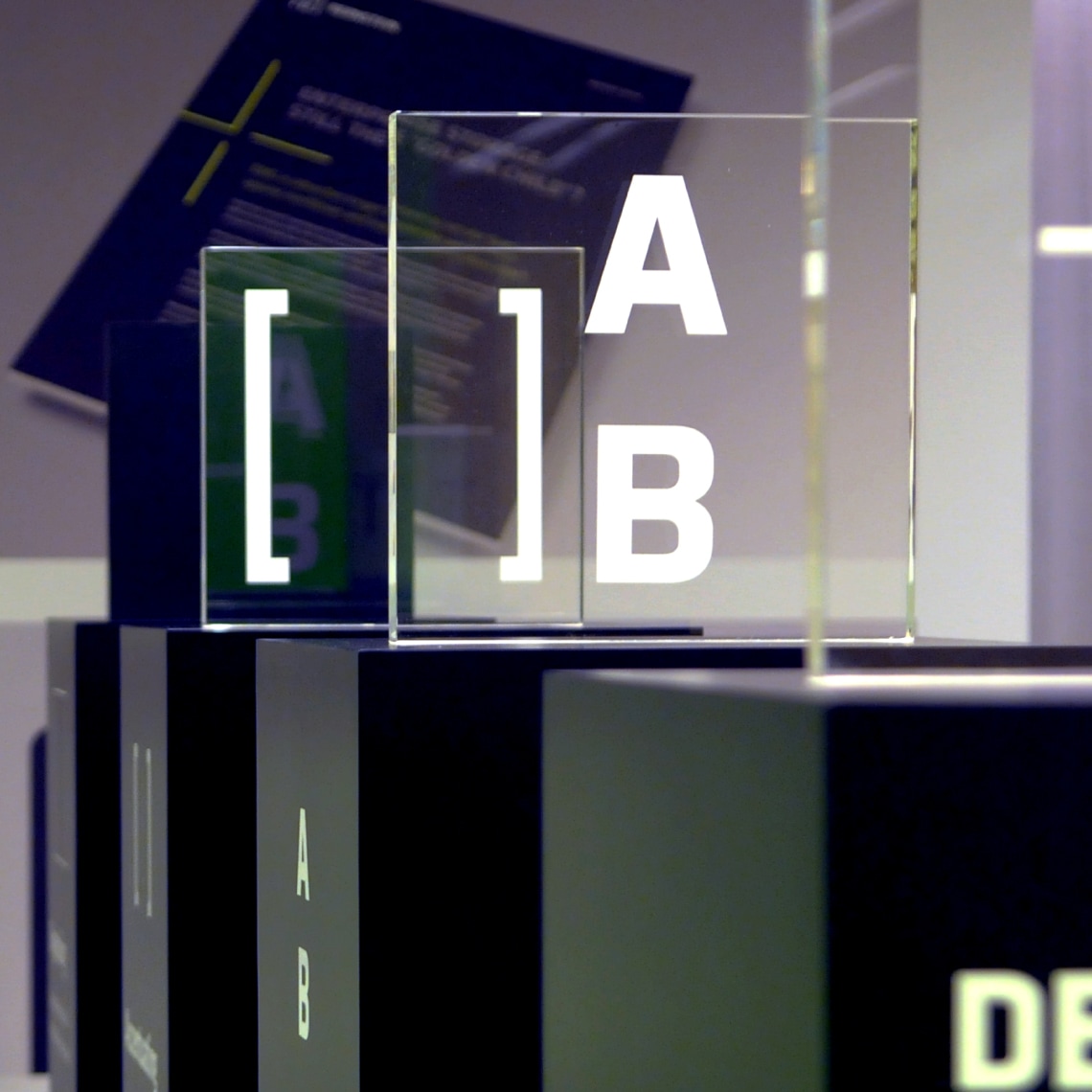 The new AB (AllianceBernstein) logo on clear acrylic squares pieces