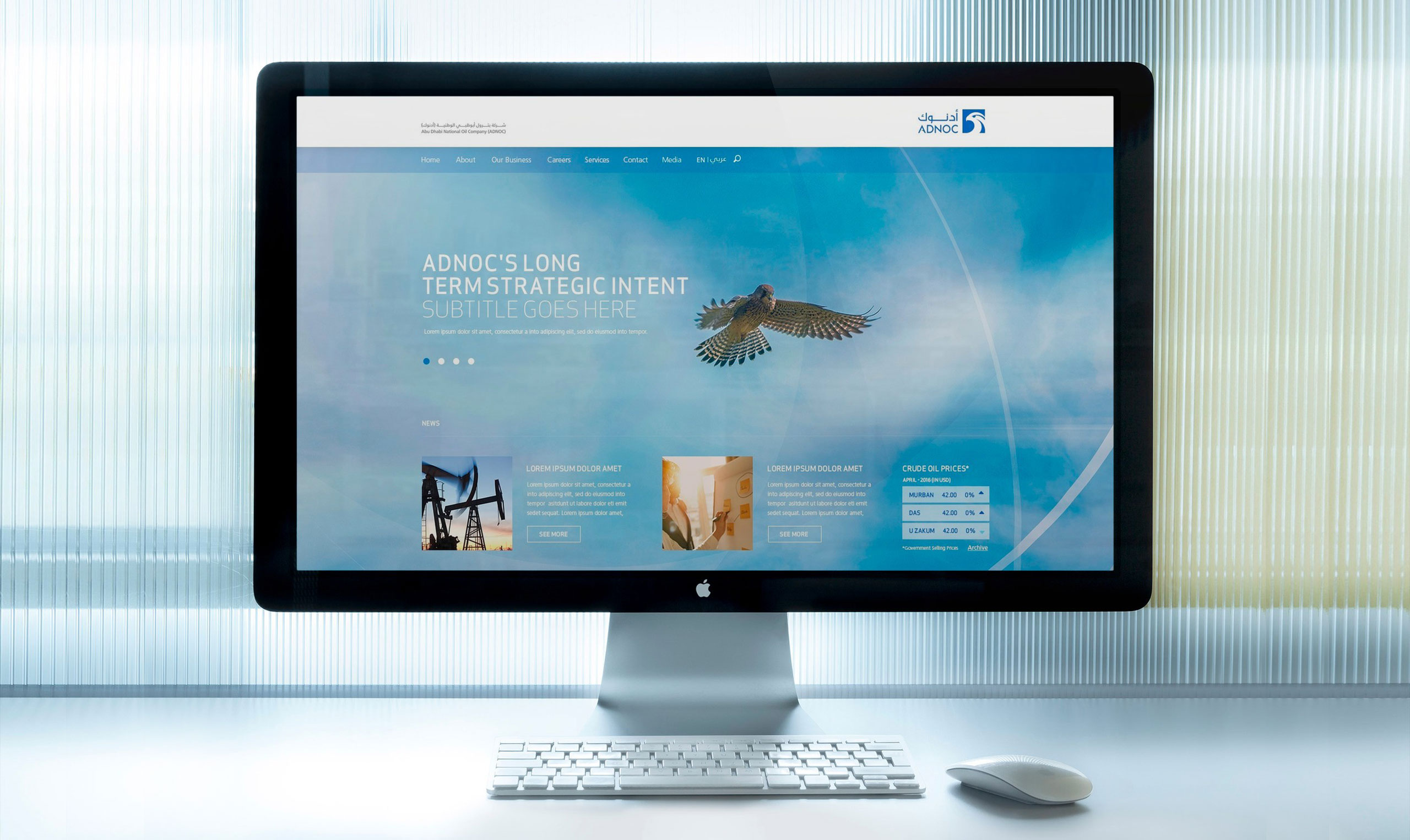 A desktop computer with the website designed and developed for ADNOC