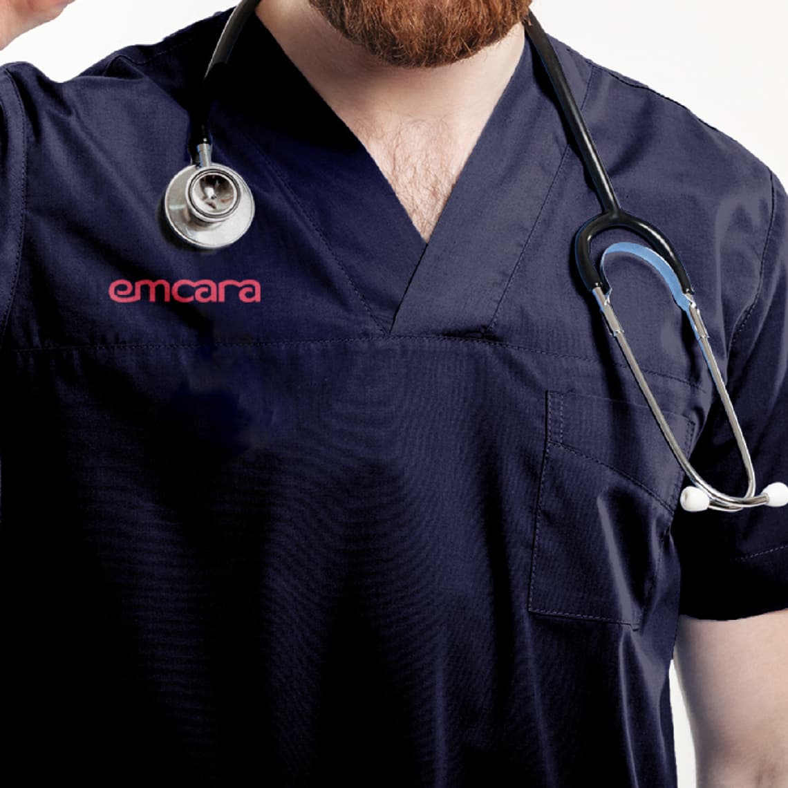 a male healthcare professional in blue scrubs with embroidered emcara logo to show how the design system is applied