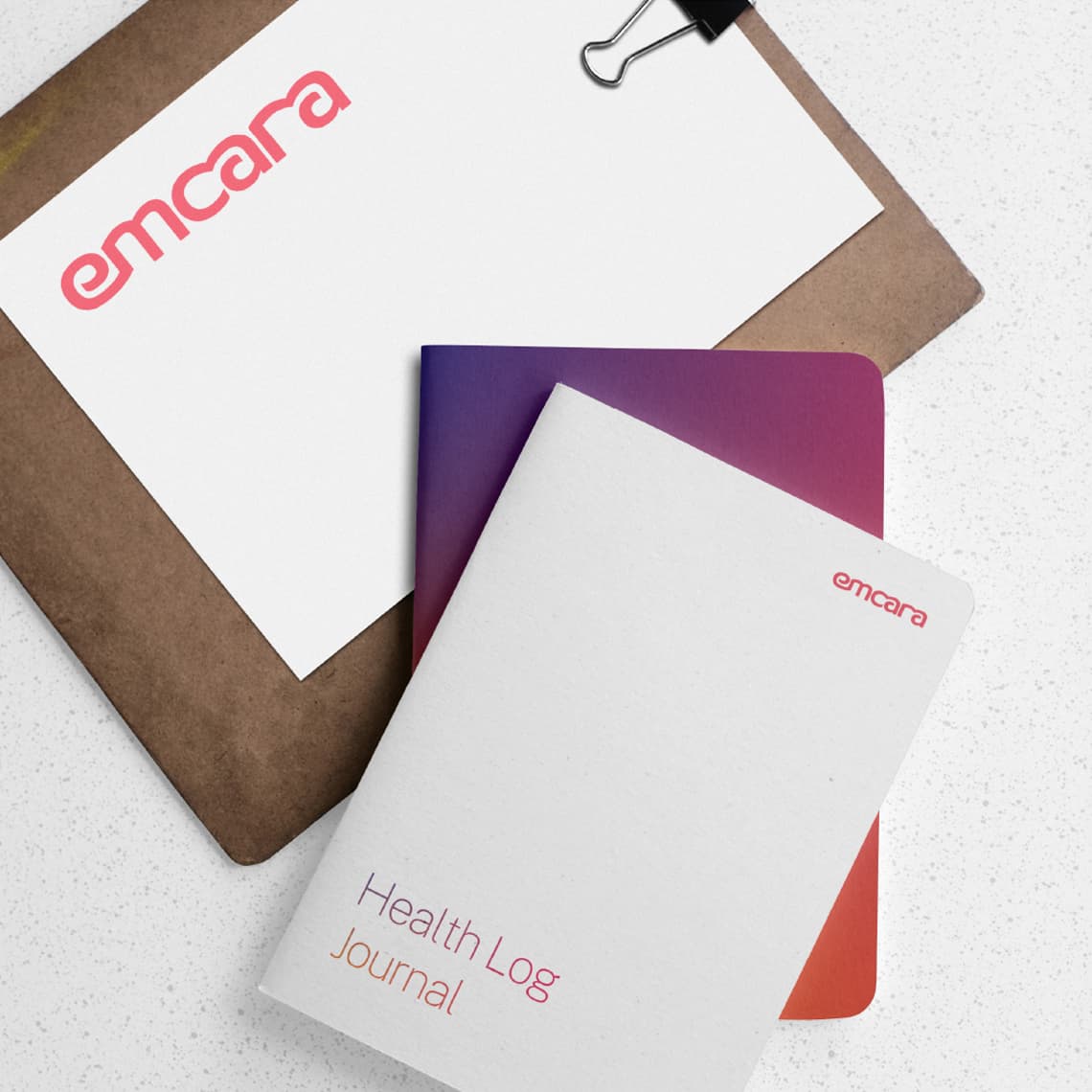 Examples of emcara's design system applied to printed material