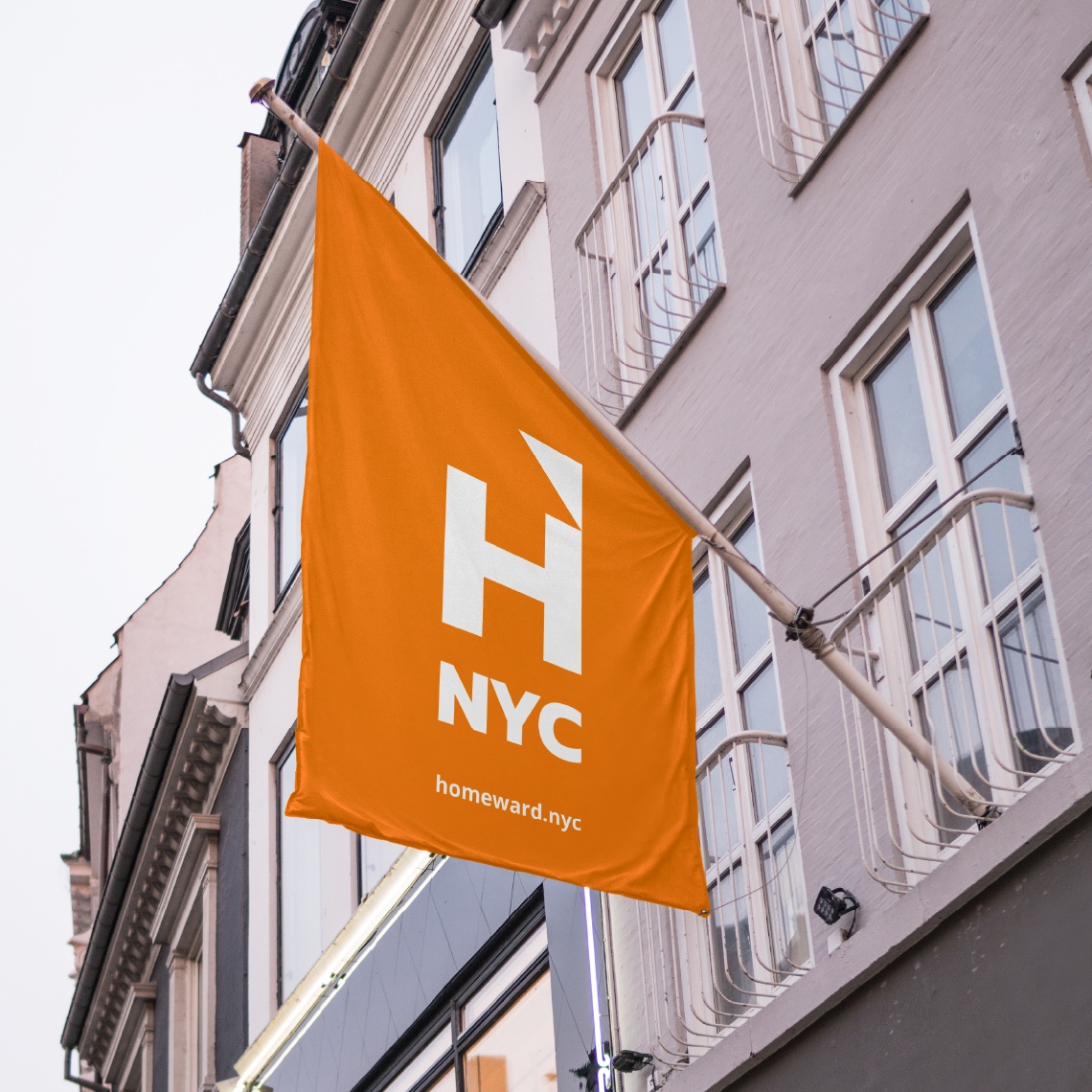 An orange Flagpole banner with the Homeward NYC logo in white, showing how the design system could be represented.