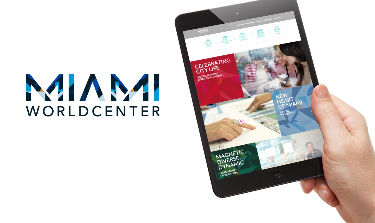 The Miami Worldcenter website is displayed on a tablet using digital tools.