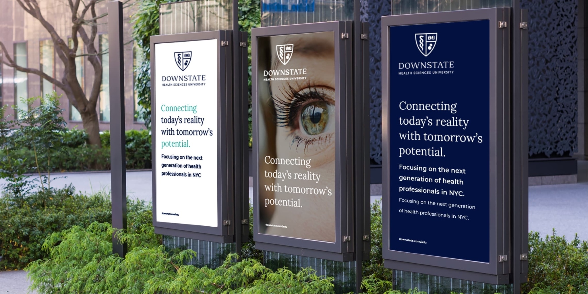 a group of three vertical billboards showing how to apply the brand identity developed for SUNY