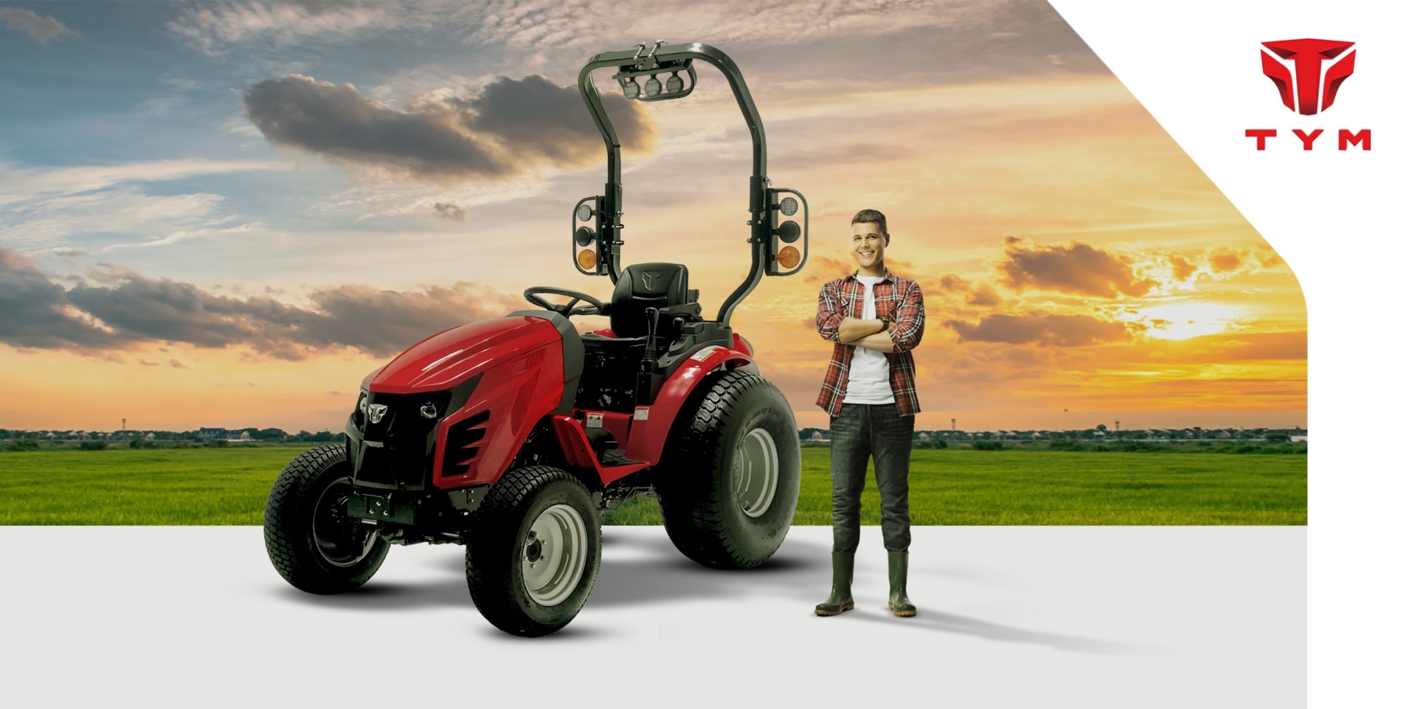 a man standing next to a red tractor. Example of printed material designed for the TYM brand