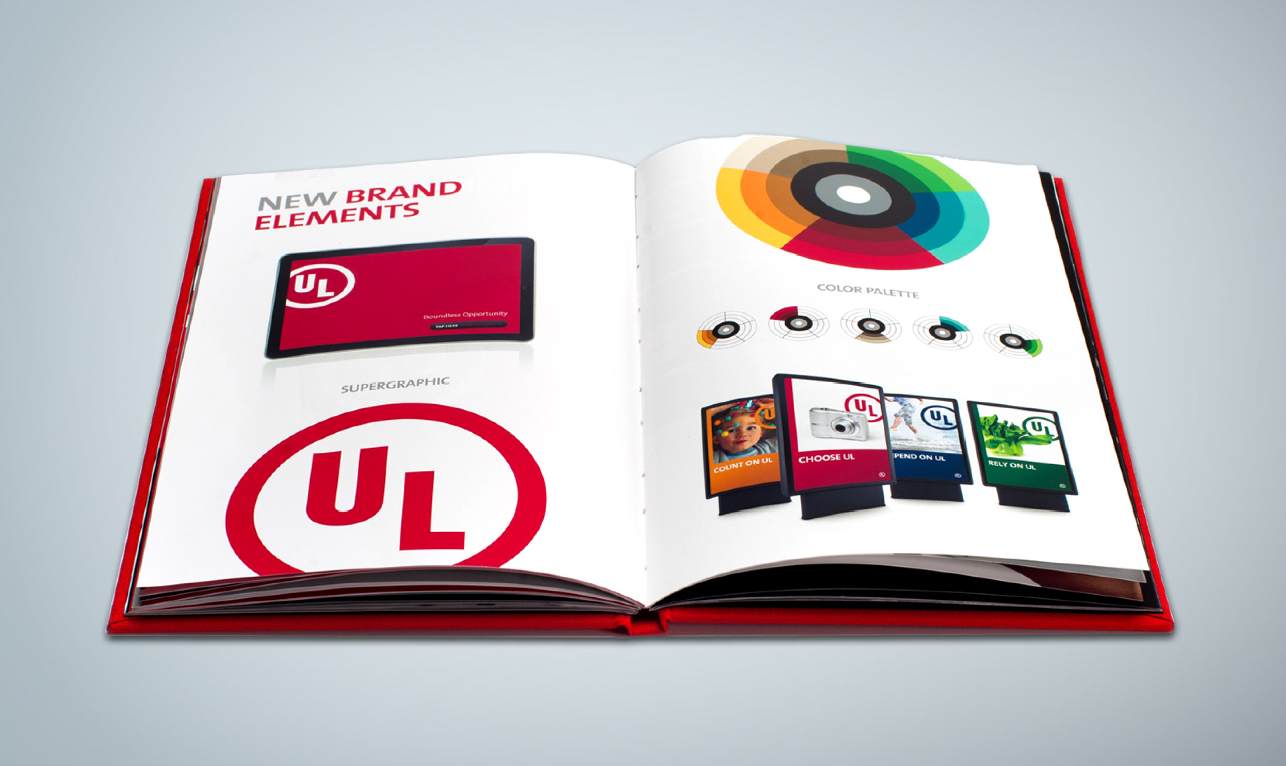 A book with a logo and various colors on it.
