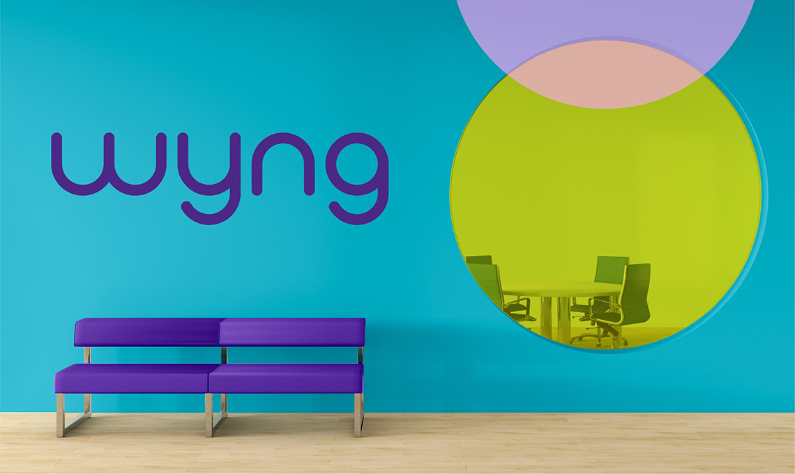 Wyng logo on a blue wall.