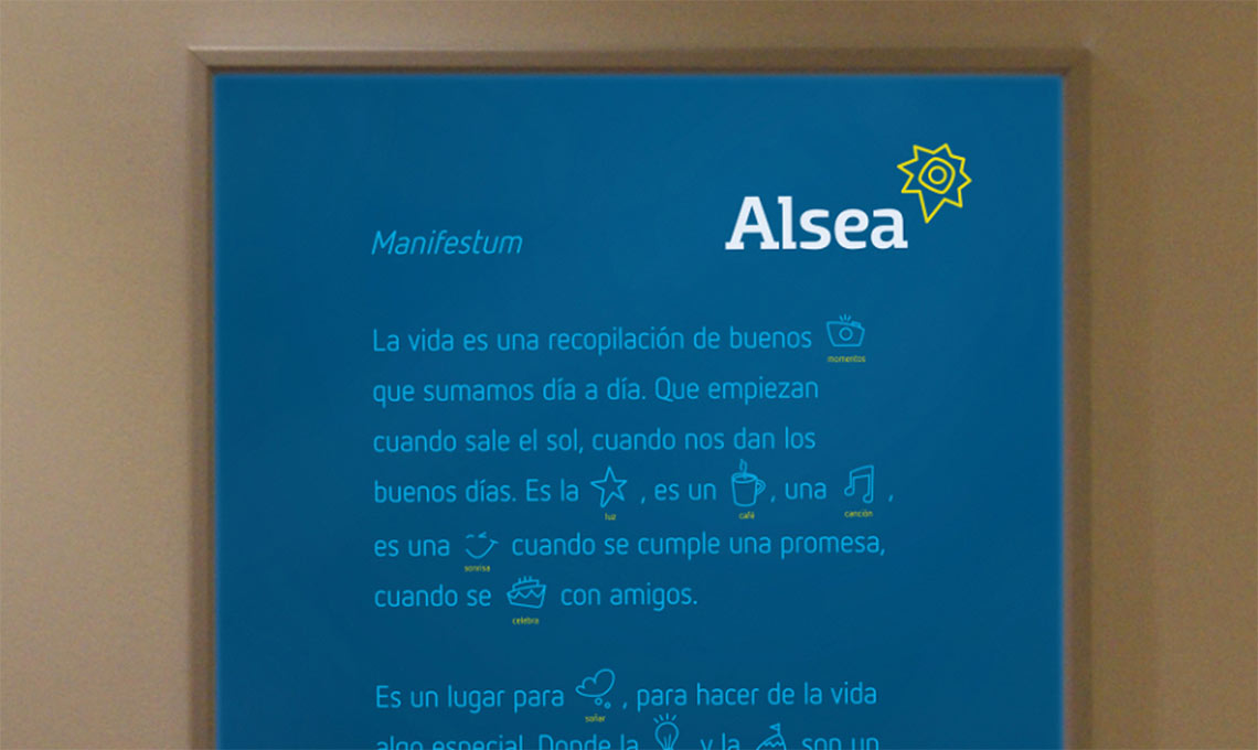 A sign that says "alsea" in Spanish on a wall promoting brand repositioning.