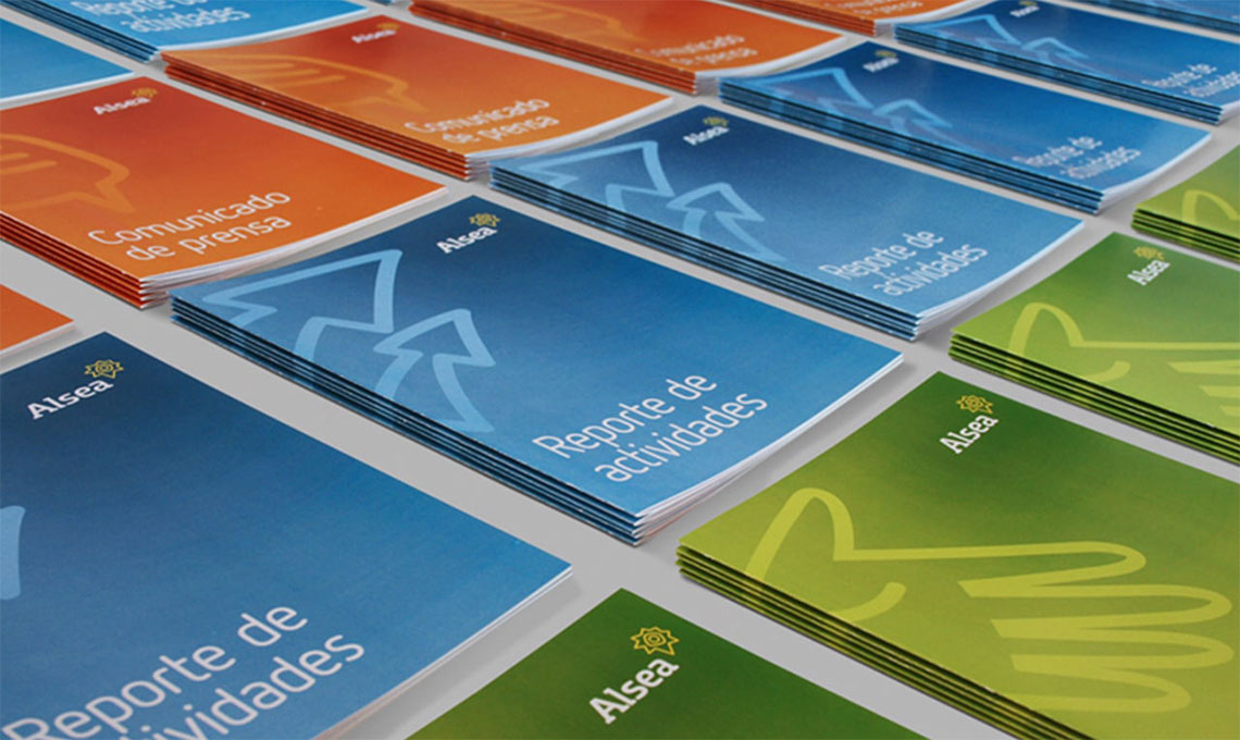 A set of brochures showcasing brand repositioning strategies laid out on a table.