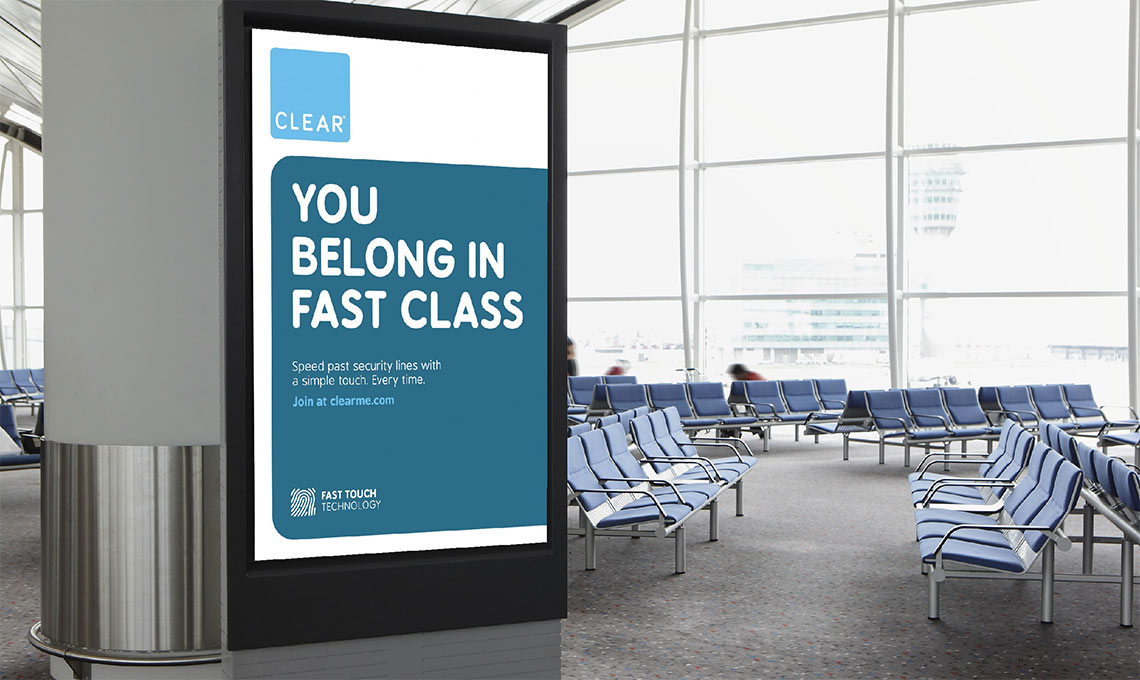 A brand awareness billboard in an airport promoting 'fast class'.
