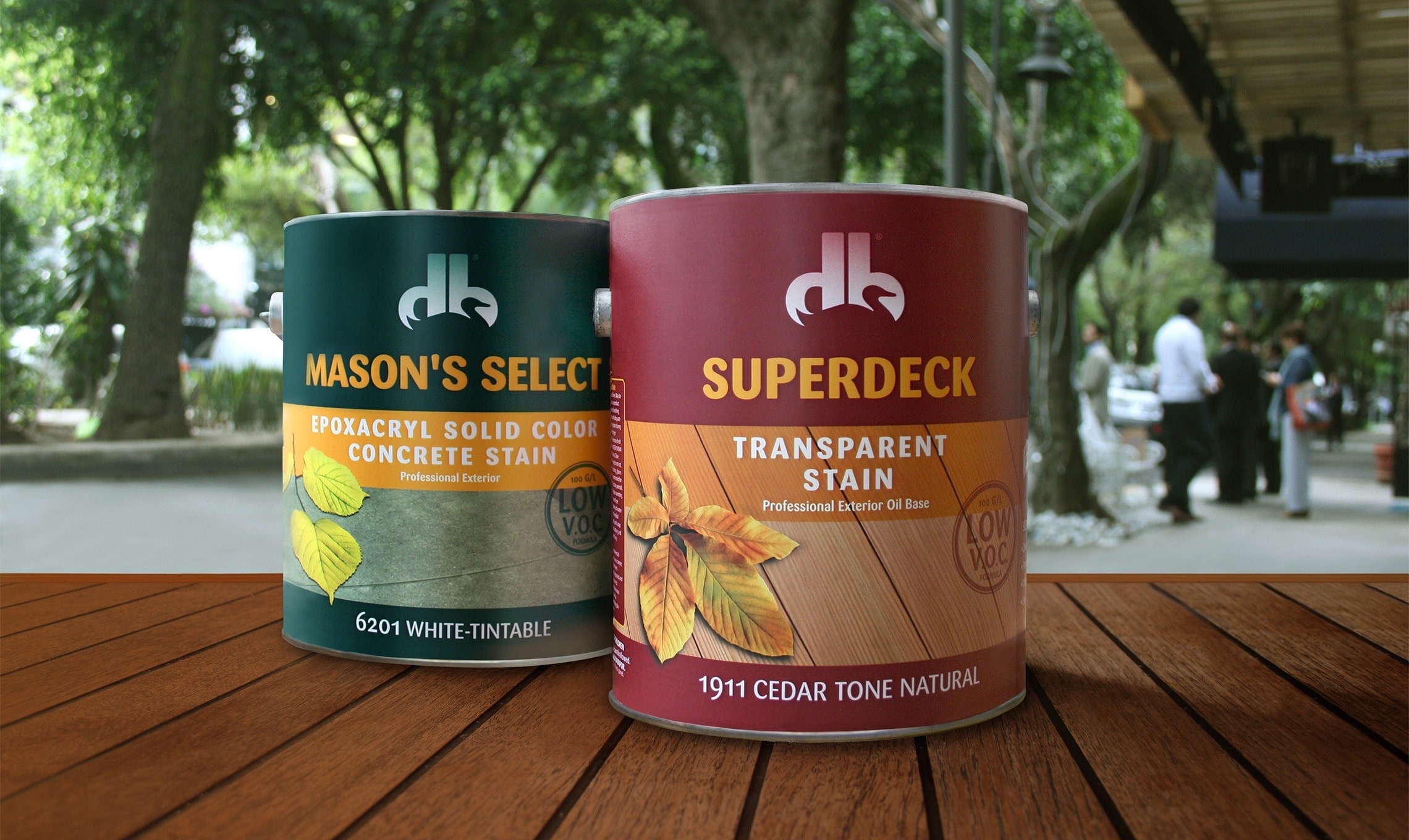 Two cans of superdeck and Mason's Select sitting on a wooden table.