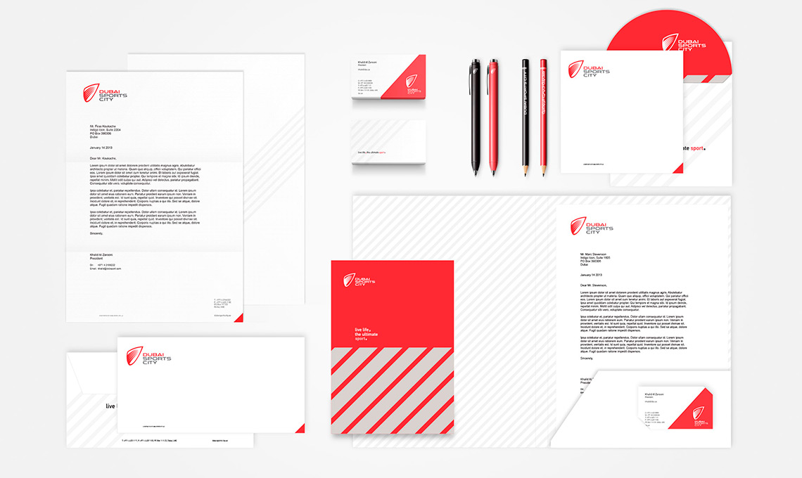 A red and white stationery set with a modern look.