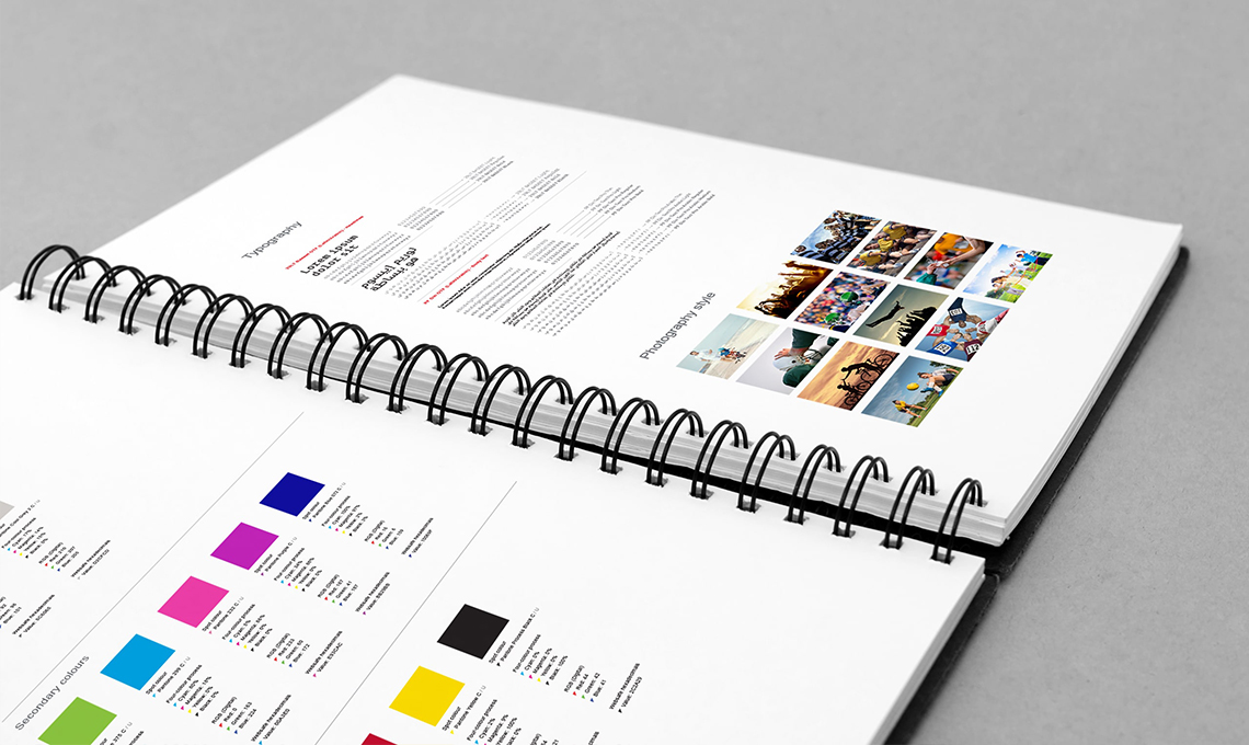A rebranded spiral notebook with vibrant colors.