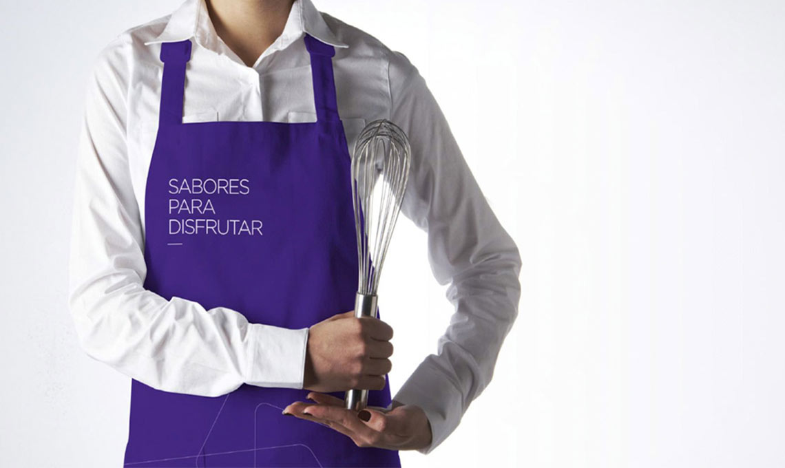 a chef wearing an apron with the design system applied to it