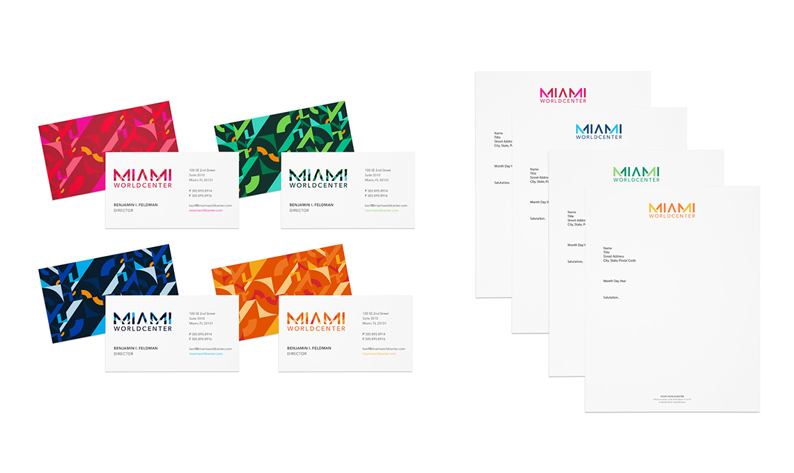 A set of bold business cards with colorful designs.