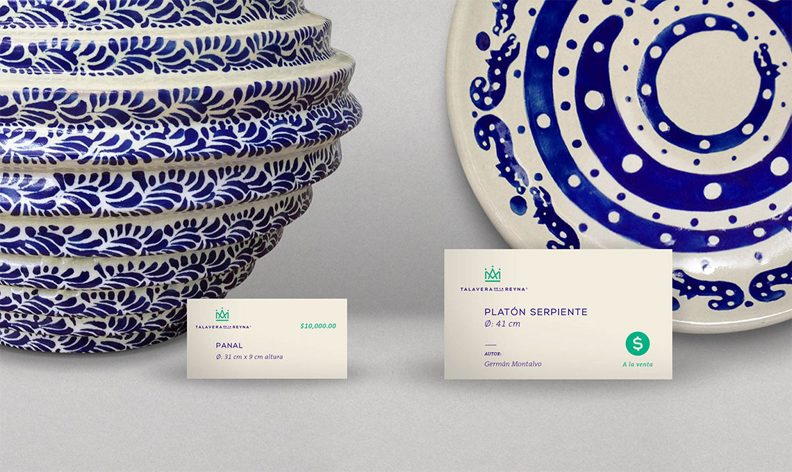 A blue and white vase fusing royal tradition next to a business card.