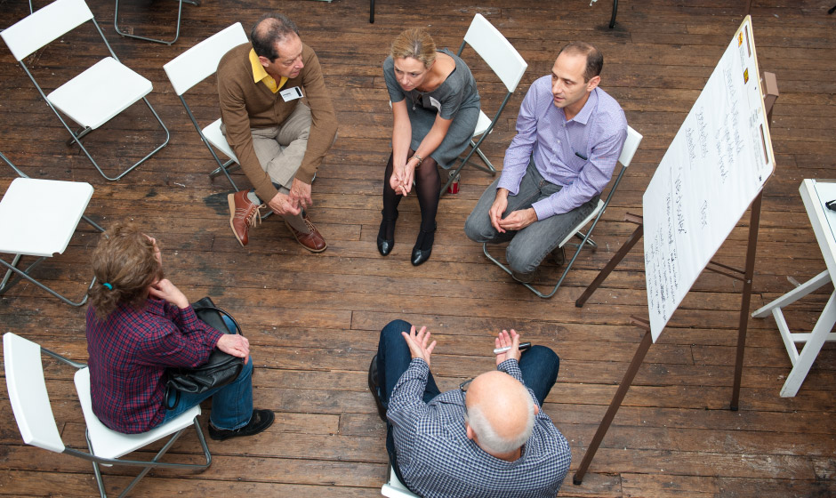 A group of people participating in user experience research activities.