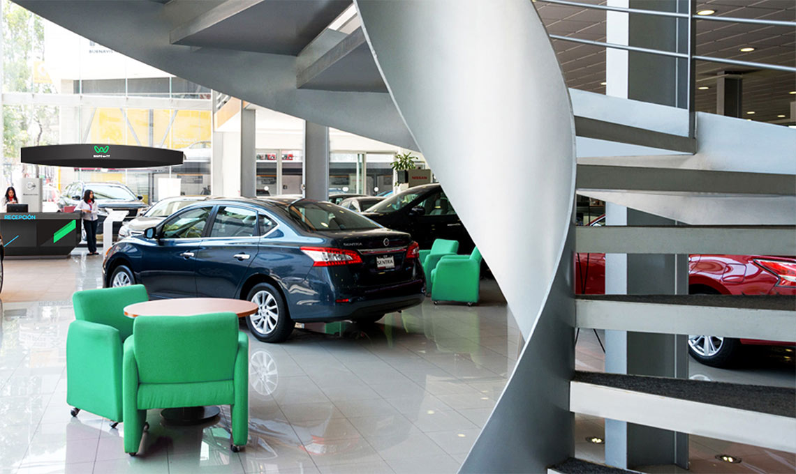 A car showroom with a spiral staircase offering a bold and innovative customer experience.