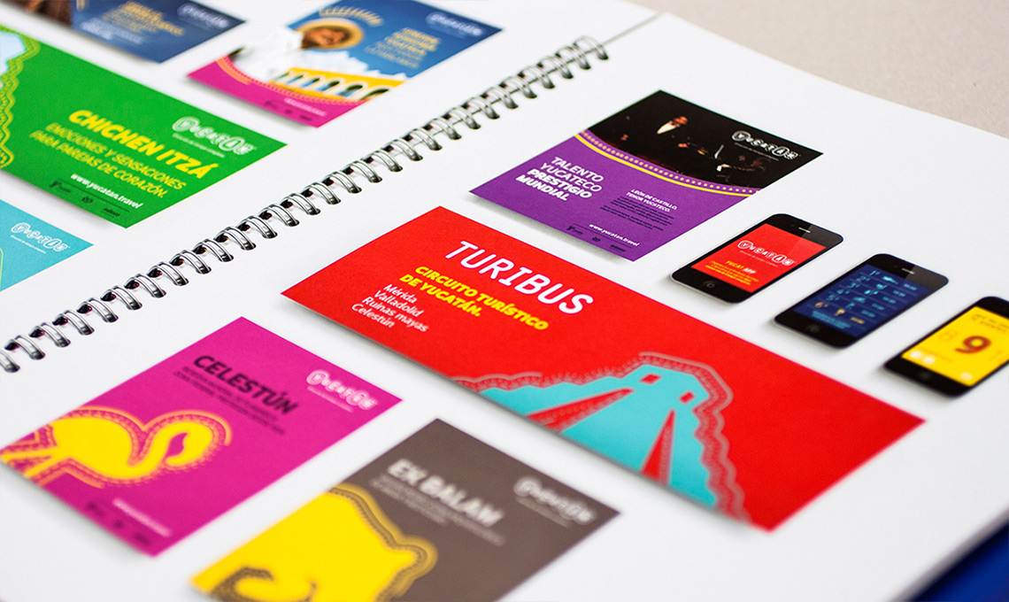 A book with vibrant destination branding business cards.