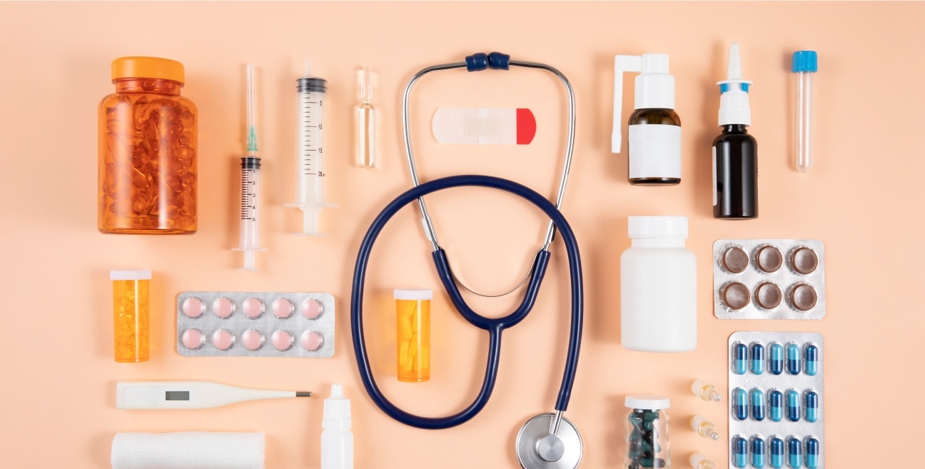a stethoscope and pills and other medical equipment