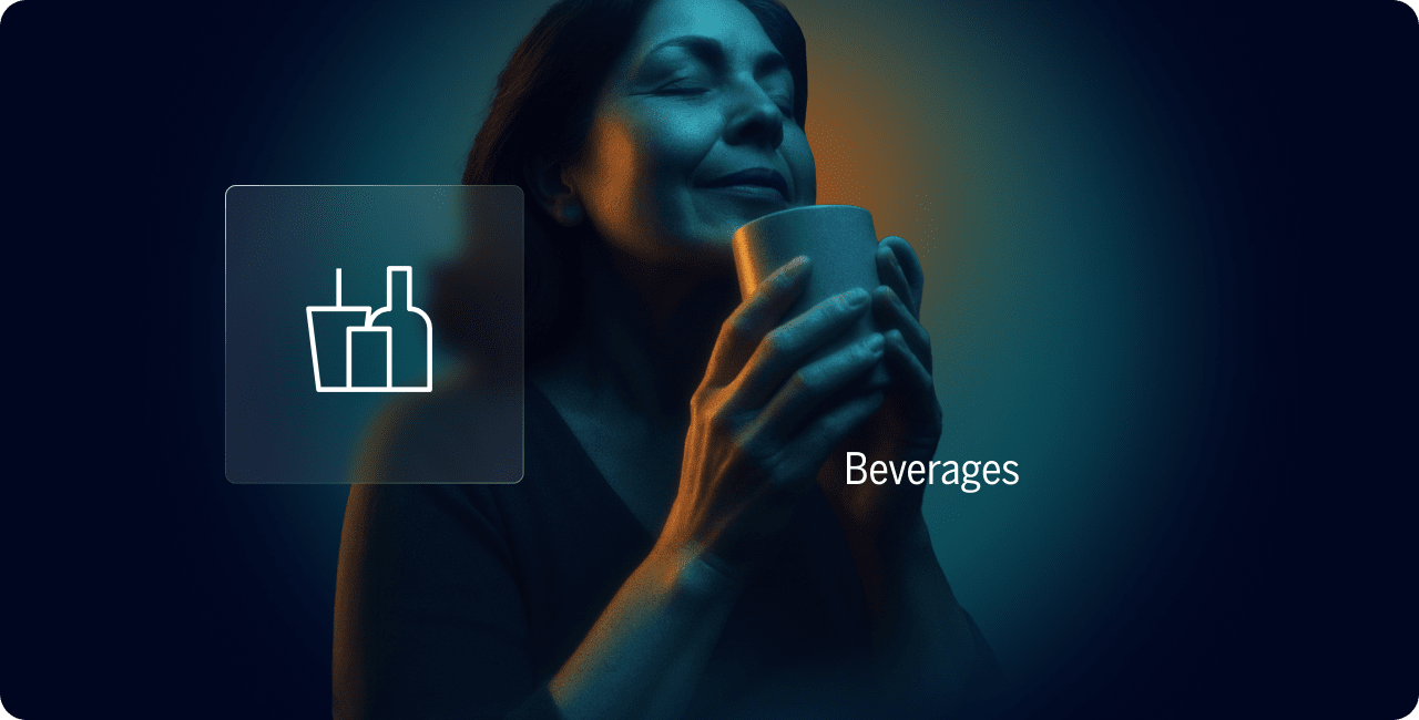 A woman holds and smells a mug with a content expression; an icon of bottles and glasses appears beside her with the word “Beverages.”.