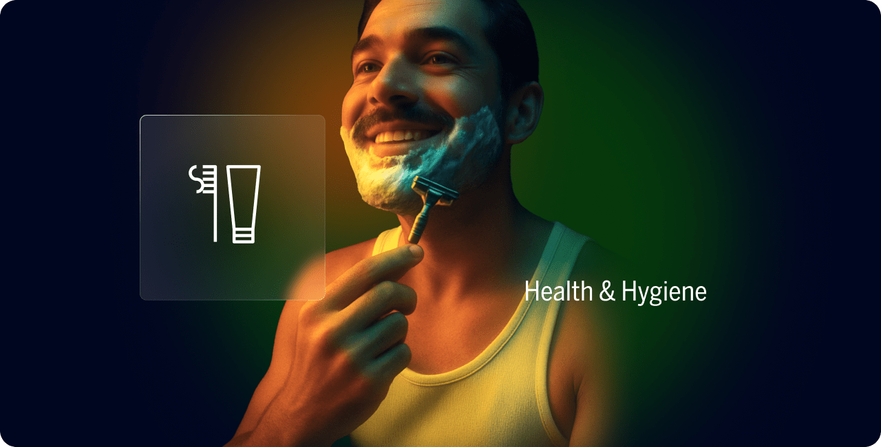 A man in a tank top shaves his face with a razor, smiling. An icon of a toothbrush and toothpaste appears, next to the text "Health & Hygiene.